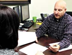 Learning the basics to better understand the mortgage process. Pictured: Roger Evans, RCB Bank lender.