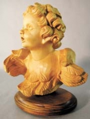 A beautiful, angelic example of chisel carving.