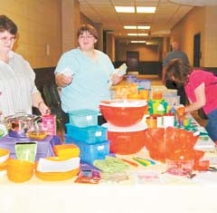 A booth filled with colorful dishes at 
last year’s Azalea Arts & Crafts Show.