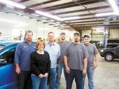 The staff of Pruitt’s Auto Collision in Owasso promises customer satisfaction. (L to R): Jeff Williamson, Liz Pruitt, Randy Pruitt, Jason Linzy, Aaron Smith and Michael Minton.