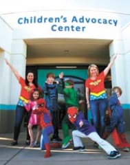 Event Chairs Marnie Phelps (left) and Leslie Croteau with their team of superheroes and sidekicks.