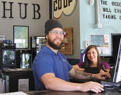 Luke Owens, owner of THE HUB in Broken Arrow, with member Brittany Taylor. Fraudsters try to avoid detection by making small purchases with your account information at local merchants.