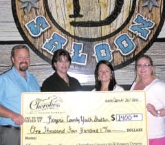 (L to R): Herb McSpadden, Rogers County Youth ­Services; Tanya Andrews and Lisa Dennis, Claremore Convention &amp; Visitors Bureau; and Jessica Putz, ­Cherokee Casino Will Rogers Downs.