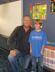 Elijah LaRue, 9, and Jeff Summers, president and CEO of the Make-A-Wish Foundation of Oklahoma, at the ­Ambassador Award ceremony on March 9, 2012 at ­Country Lane Intermediate Elementary.