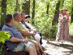 Guests enjoy a poetry reading at last year’s Poetry Walk at the Oklahoma Centennial Botanical Garden.
