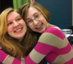Shelby Giesler, who plays Emma, and Kelly Larson, who plays Martha, have fun during rehearsals for “The Secret Garden.”