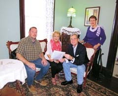 A mystery needs to be solved. Can you help find the murderer? Committee members discuss the upcoming fundraiser for the Rogers County Historical Society—a murder mystery written by Mark Ogle—which will be held at the Belvidere Mansion during April. (L to R): (Seated) 
Patrick Deaver, vice-president of the RCHS; Hoytanna Benigar, RCHS president; Mark Ogle; and (standing) Kathy Wilken, Belvidere Tea Room manager.