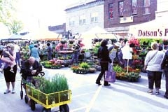 Shoppers enjoy the variety of plants at last year’s Herb &amp; Plant Festival, hosted each year by the Jenks Garden Club.