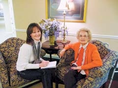 Rose Strawser, owner of Riverbend Nutrition, discusses nutritional supplements with long-time customer Mary Pringle of Tulsa.