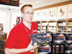Jacob Keech, sales associate at the new GNC in The Shops at Broken Arrow.