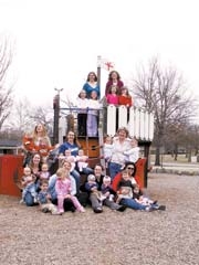 Members of Tulsa Mothers of Multiples with their twins (L to R): (Top Row) Hannah Lawrence, Deb Carroll, (Middle Row) Debra Hassell, Jennifer Quinnelly, Cathy Capozziello, (Bottom Row) Natalie Woody, Michelle ­Huggins, Rachel Bright and Kym Brophy.