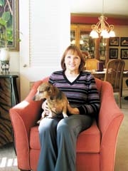 Leslie Thunell, a happy patient of Spinal Decompression of Oklahoma, with her dachshund, Dabney.