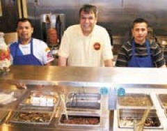 Owner Mo Alhilalat with his crew at Alsultan Mediterranean Grill &amp; Bakery.