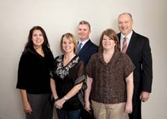 Staff members of Glenpool’s The Insurance Crew, from left: Carolyn Duncan, Genny Coats, Dirk Hunter, Kim Briggs, and Shane Allbee.