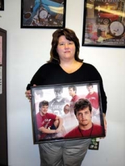 Teresa Dexter holds a photo collage of her son Josh who died from a prescription drug overdose in 2010.