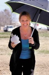 Protect yourself from life’s unexpected downpours with an emergency fund account. Pictured: RCB Bank employee Kim James.