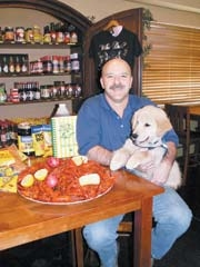Ed Richard invites everyone to meet Saint at Crawfest 2010 and help him become a champion Therapetics service dog.
