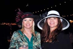 Katie Lefler and Mandy Smith dress up for the fundraiser’s hat contest.