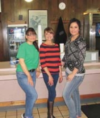 Carl’s Coney Island, founded in 1974 by Bill and Yvonne “Jean” Schloss, is still a Claremore landmark and the go-to place for a good coney. Current owner, Beth Truitt—the Schloss’ daughter—pictured in the center, purchased the family business with her husband, Ed, in 1998.  With Beth are employees, Crystal Cleek, left, and Grace Wallace, right. The restaurant is located in Ne-Mar Center.