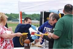Sampling the barbeque is one of the most popular parts of the Claremore Reveille­ ­Rotary Club’s annual Boots & BBQ festival.