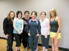 Owner Adana Gittelman (center) and Instructor Toni Hatfield (left) with ladies attending Zumba class.