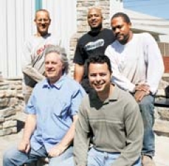 (Front row, L to R) Vice President of Marketing Mike Howell, President Dagan Heaps, (Back row, L to R) Production Manager Wade Hight, and production crew members Terry King, Ronnie Smith and Terrance Lark (not pictured) make up the team at Impressions in Stone of Tulsa.