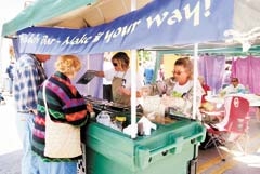 The Tabouleh Bar serves up traditional tabouleh and unique dessert tabouleh to festival attendees.