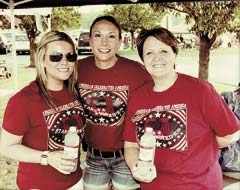 Stephanie Walters, Sarah McCormick and Betty Calley are hard at work preparing for the 18th annual fireworks show.