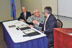 Pictured after a recent signing ceremony on the Rogers State University campus are, from left, Bill Ramsay, President of the Oklahoma Military Academy Alumni Association, Oklahoma Adjutant General Myles Deering and Rogers State University President Dr. Larry Rice.