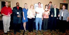 The Goodwill Awards Luncheon winners included (L to R): Target representative ­Brandon Corbin, Azande Campbell, Mistress of ­Ceremonies Deana Silk, Carol Gibson, Jeremy Gillespie, Danita Bennett, John Mahar and Lori Morton.