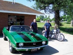 Claremore firefighters Chris Hayes and Jimmy Hamilton with vehicles to be featured at Hotrods and Heroes.