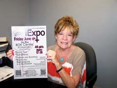 Susan Jensen, BLAST project director with Rogers County Volunteers for Youth, invites young ladies to the iExpo.