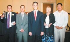 2010 Goodwill award winners and emcee (L to R): Brook Losornio, employee of the year; Bruce Sweet, graduate of the year; emcee Mike Collier of KTUL News Channel 8; Teresa Dickey, achiever of the year; and Lang Khup, Perseverance Award winner.
