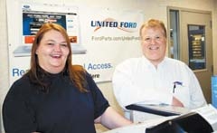 Nancy Yingst and General Manager Rusty Magiera at United Ford Parts Distribution Center.
