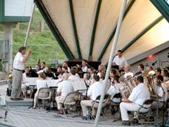 Dale Barnett conducts the Starlight Concert Band at River West Festival Amphitheater.