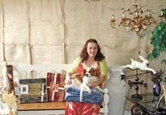 Nancy James and the family dog, Jesse, invite everyone to stop by and browse through Homeward Bound.