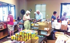 Volunteers sort and sack school supplies for Rogers County schoolchildren in need. This will be the 17th year for Claremore First United Methodist Church to coordinate the Rogers County School Supply Drive, which has grown steadily since 
its inception.