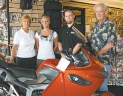 The staff of BMW Motorcycles includes Co-owner Judy Ewerling, Parts Manager Carita Lahdenitty, Sales ­Manager Matt Holman and Co-owner Bill Ewerling.