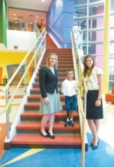 Director Carrie Koewing, former patient Jonah White, and Fundraising Associate Jenny Gardner.
