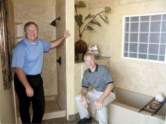 Warren Simms and Glenn Simms in the Re-Bath of Tulsa showroom.