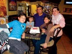 Francisco and Giselle Barbosa with their children.