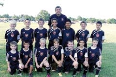 Academy Director Greg Wilson with Tulsa Nationals ­Academy players.