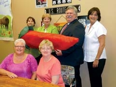 Rockin’ the Chili Pepper are (seated, L to R) Sherry Hinds and Candi Czapansky; standing are Valerie Gunter, Dell Davis, Dave Chaussard and Tanya Andrews.