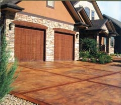A sample residential driveway by Impressive Design ­Concepts with complimenting color and pattern.