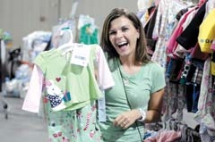 A shopper finds a great bargain at a recent Just Between Friends sale.