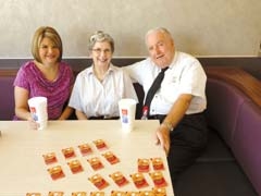 Michelle Hayes of Rejoice Church and Beverly and Harry Lossing of McDonald’s.