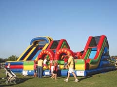 Children can enjoy inflatable fun at the annual fly-in.
