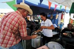 A festivalgoer samples one of the many varieties of chili at the Claremore Bluegrass &amp; Chili Festival coming up this year September 4-6 at the Claremore Expo.