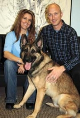 The Demand Project co-founders Kristin and Jason Weis with Indy.