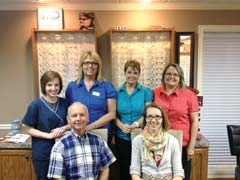 The staff at Claremore Eye Associates (L to R): (Standing) Kristin Kress, Becky Garoutte, Kim Marcotte, Betty Mitchell, (Seated) Dr. Steve Smith and Dr. Lacy Crissup. (Not pictured: Dr. James Stover.)